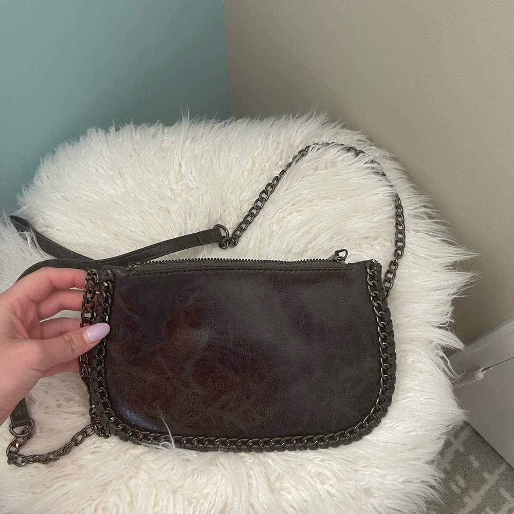 Black crossbody bag with silver hardware
